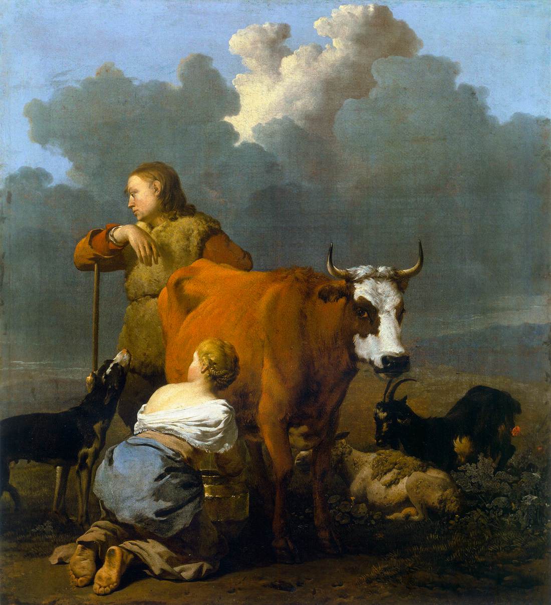 Femme trayant une vache rouge