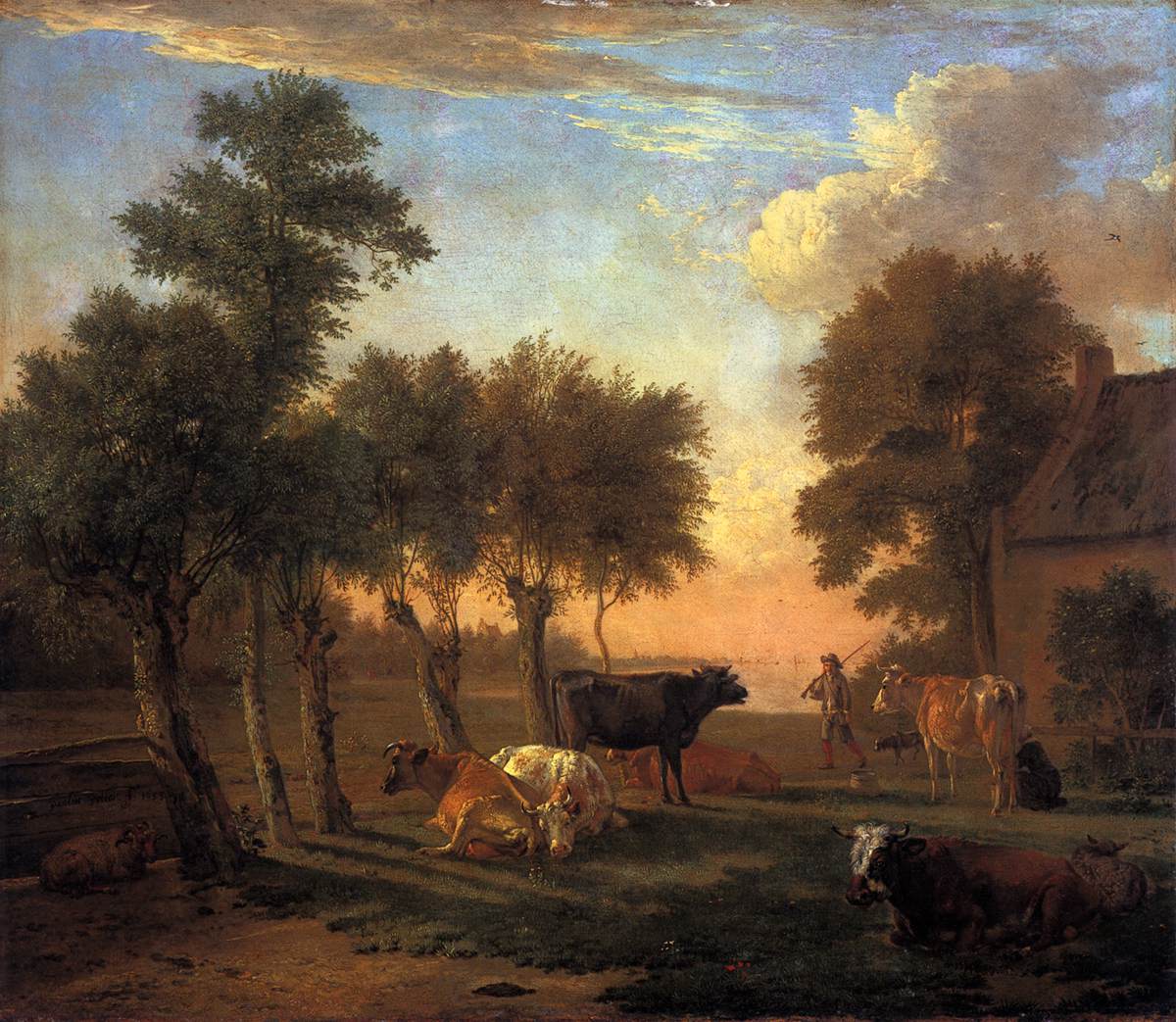 Vaches dans une prairie près d'une ferme