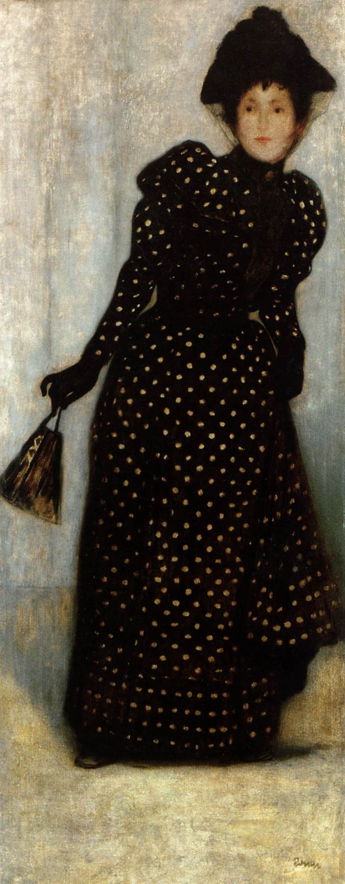 Femme vêtue d'une robe à pois