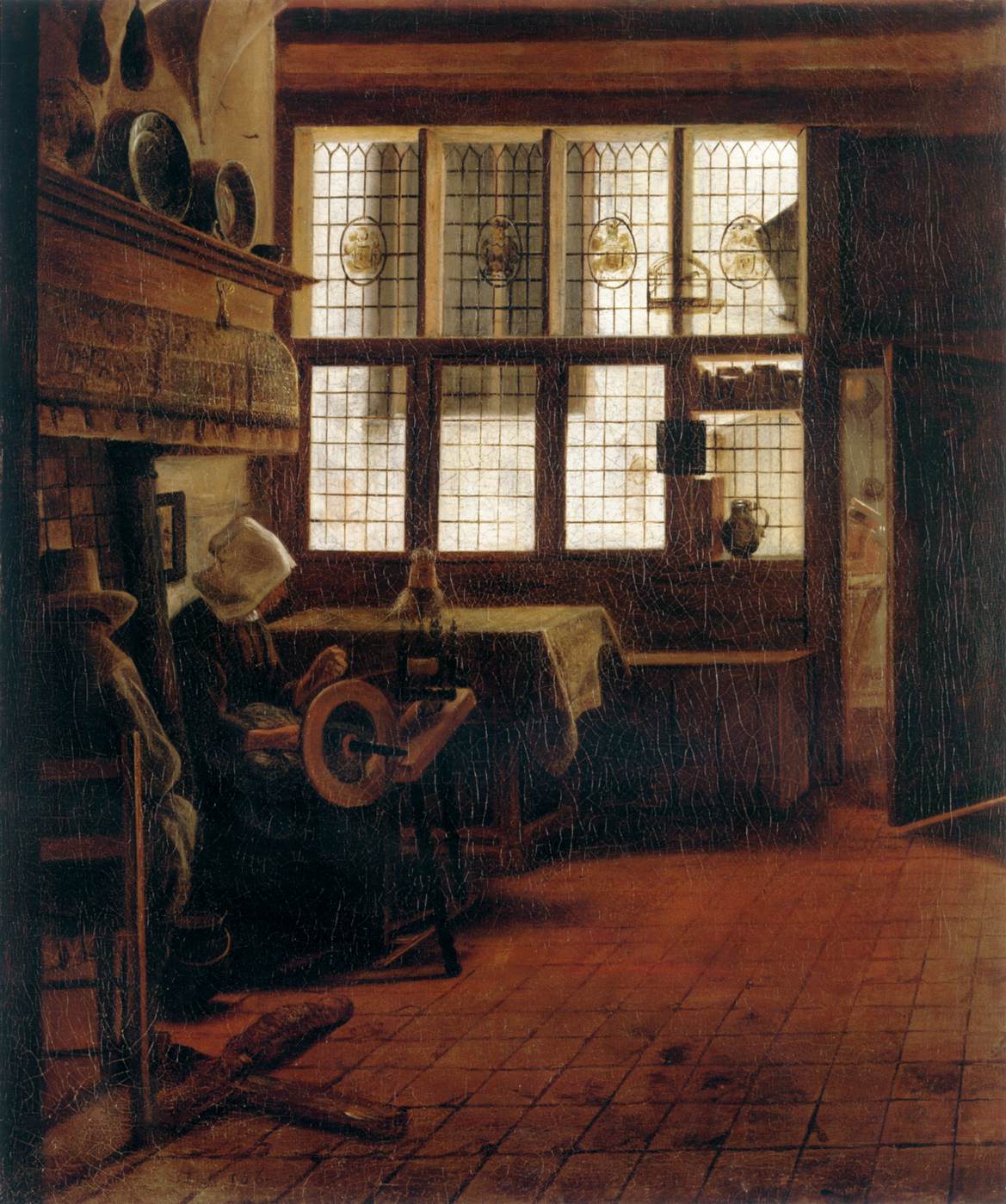 Intérieur avec une femme au rouet