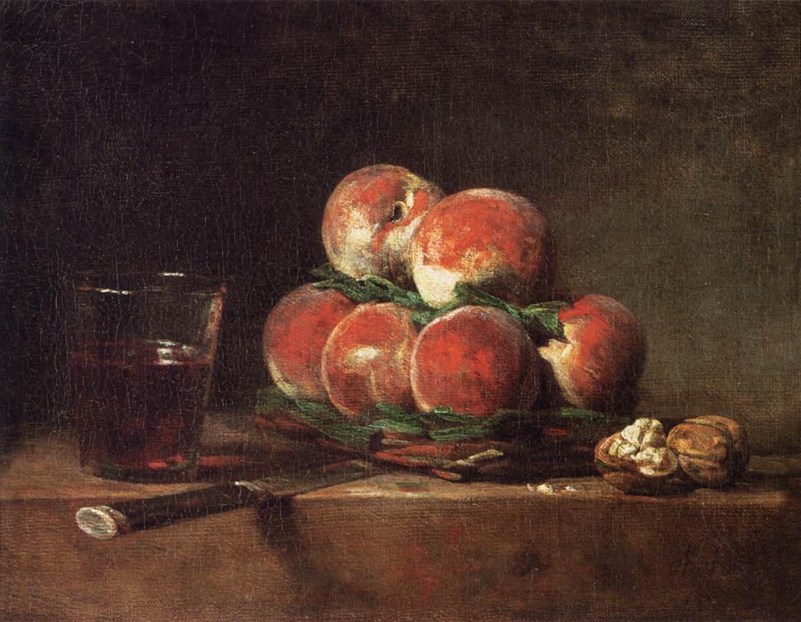 Panier de pêches avec noix, couteau et verre de vin