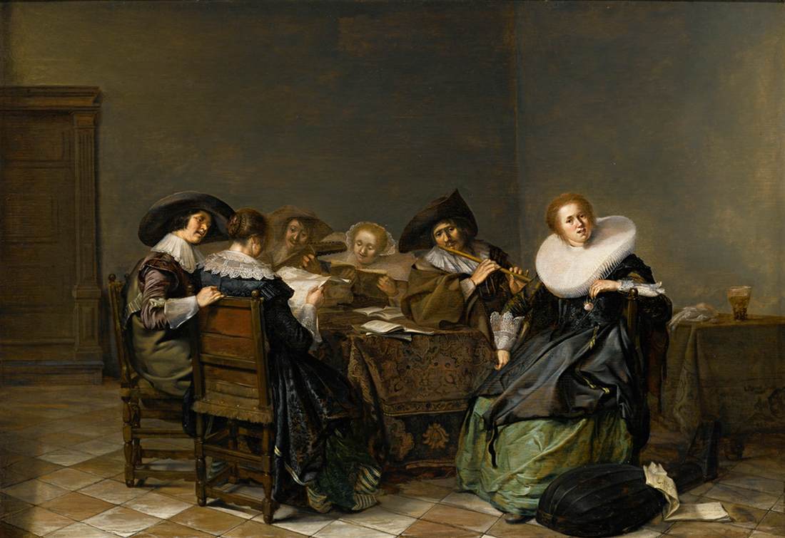 Intérieur avec des musiciens assis autour d'une table