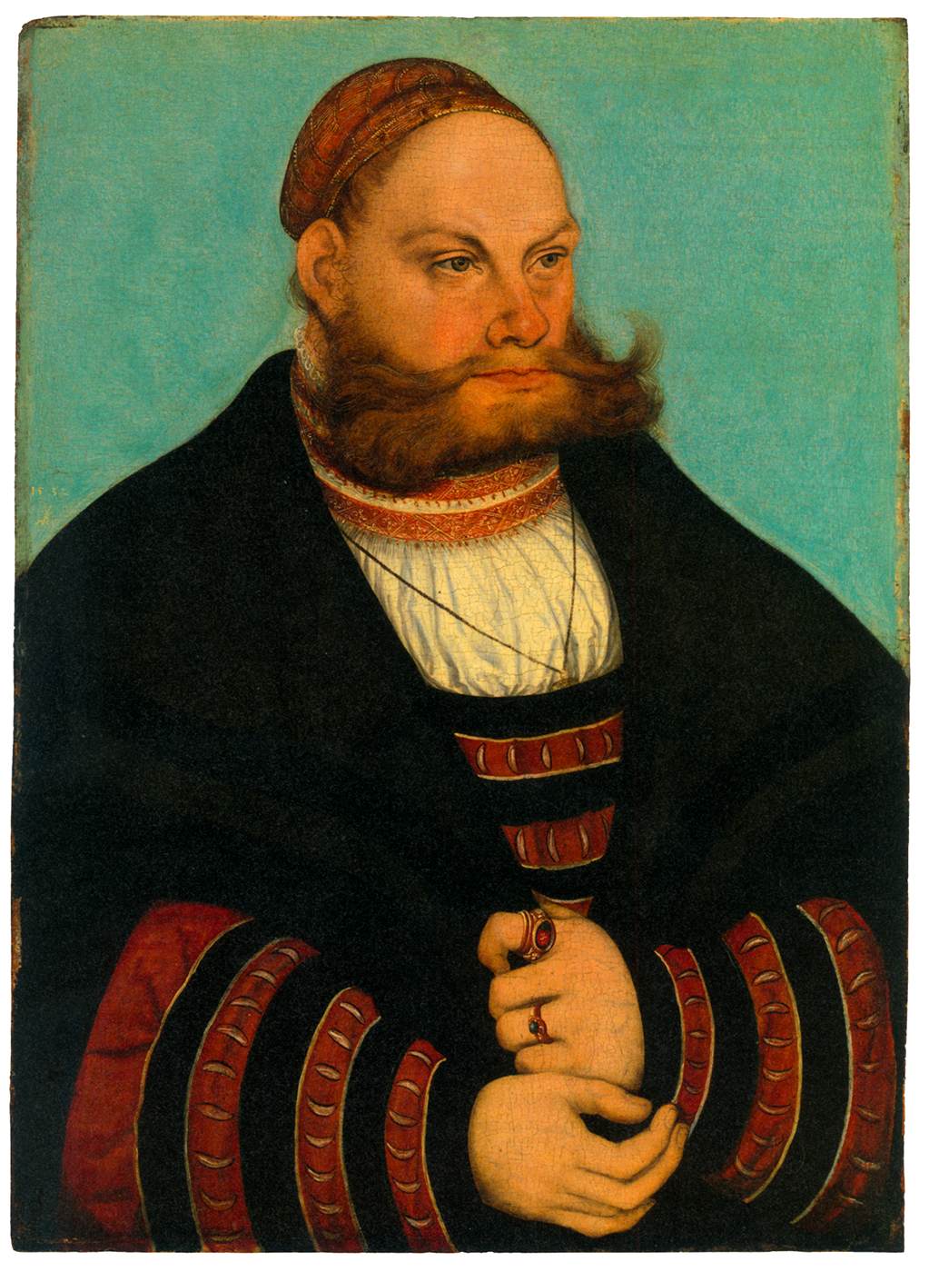 Portrait d'un homme au bonnet brodé d'or