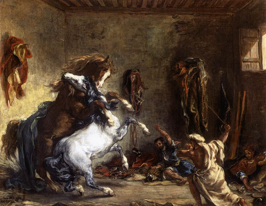 Chevaux arabes se battant dans une écurie