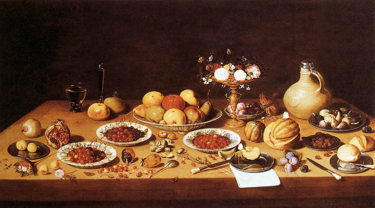 Nature morte sur une table avec fruits et fleurs