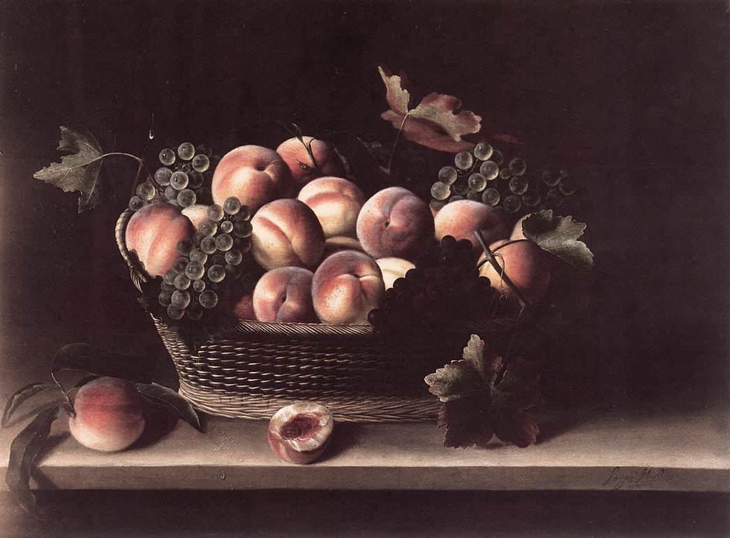Panier de pêches et de raisins