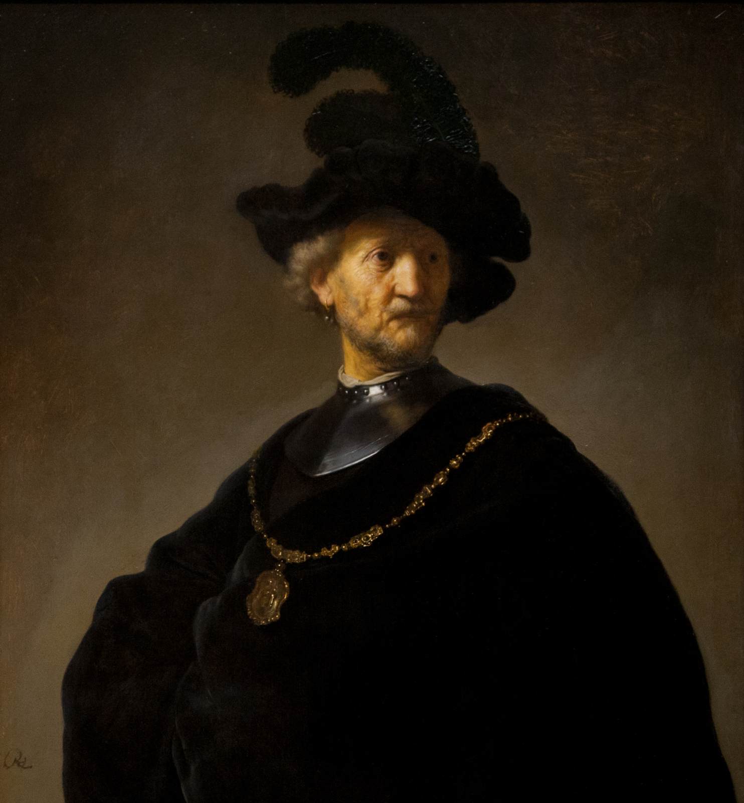 Vieil homme à une chaîne d'or