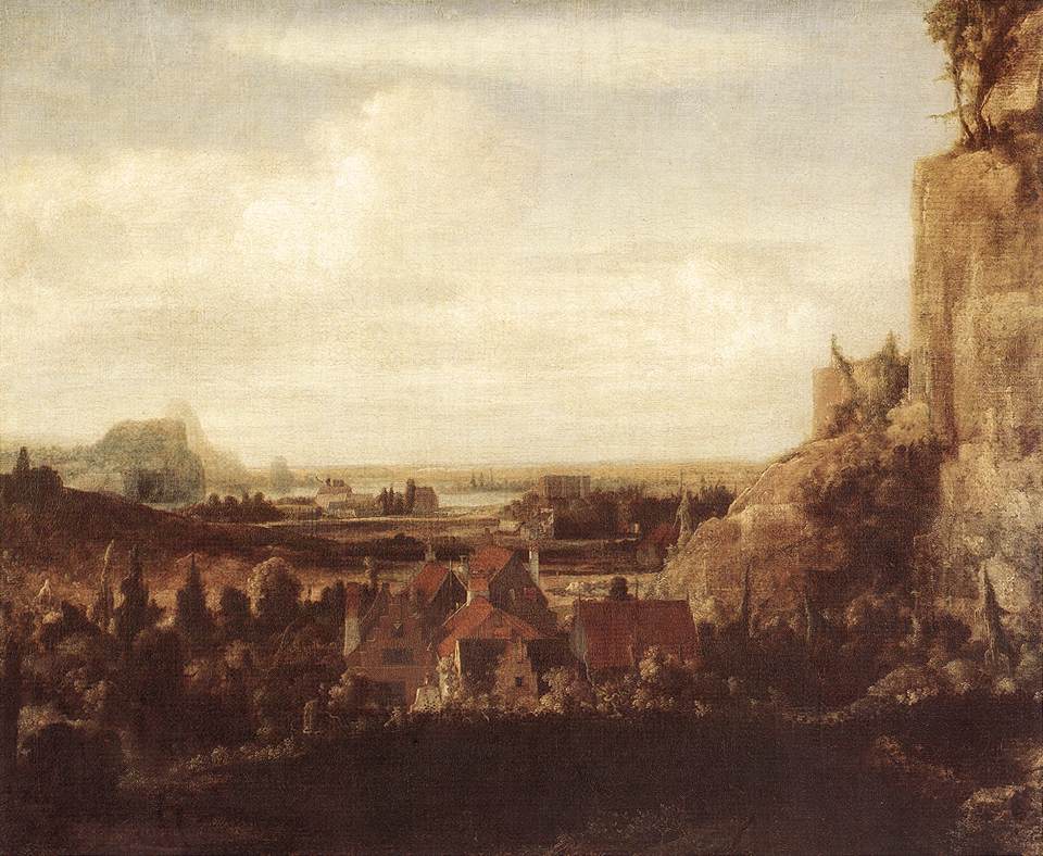 Une vallée fluviale avec un groupe de maisons