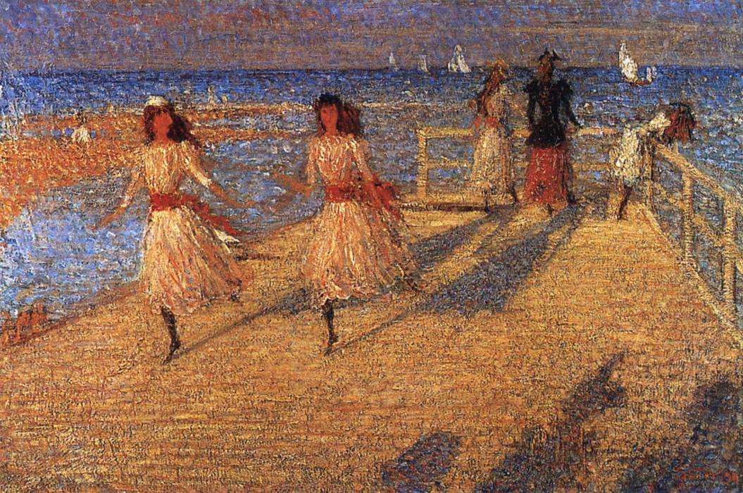 Filles courant sur la jetée de Walberswick