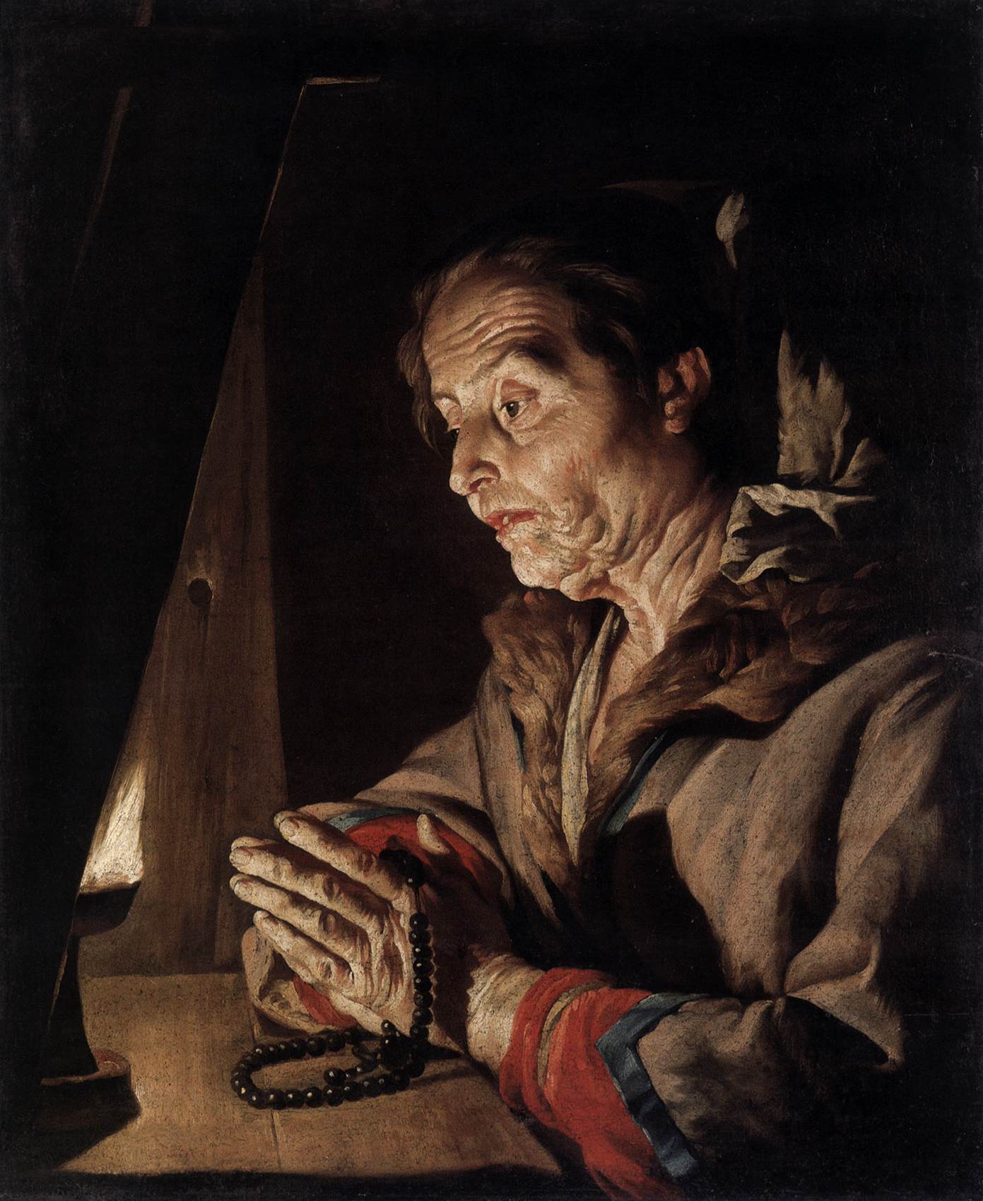 Vieille femme en prière